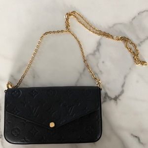 Small crossbody Louis Vuitton purse
